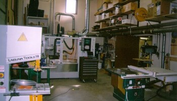 This is the front room on the ground floor. You will find the Fadal, a 10" and a 12" table saw, a 12"radial arm saw, and a Bridgeport milling machine to name a few.