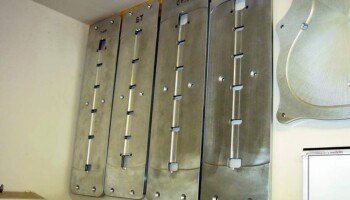 These fixtures are used to route the back center reinforcement strip to receive the back braces