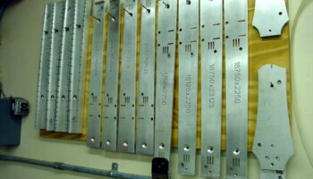 Different sized pegheads, and or neck widths, can have holes located accurately with one of the many hole drilling fixtures