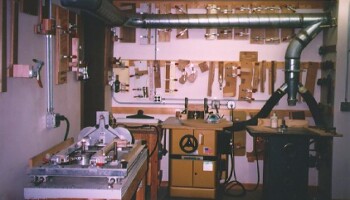 The two shapers and various templates are used mainly for making braces and a number of operations on the necks.
In the left foreground you can see a neck carving machine that Jim used to carve necks before the Fadal took over this duty