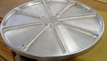 This is a "radius" dish to sand the radius of the guitar rims to receive the back. It was machined from 1" thick alumuinum in the Fadal