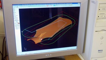 This is the same drawing with the surface shading on. From this drawing all the toolpaths can be generated to machine the back of the peghead