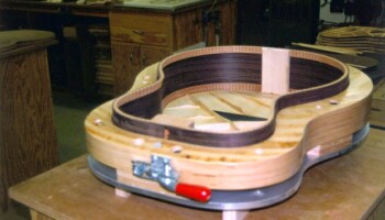 Here the form is holding a top (on the bottom!) and sides; you can see the top bracing and bridge plate in this photo